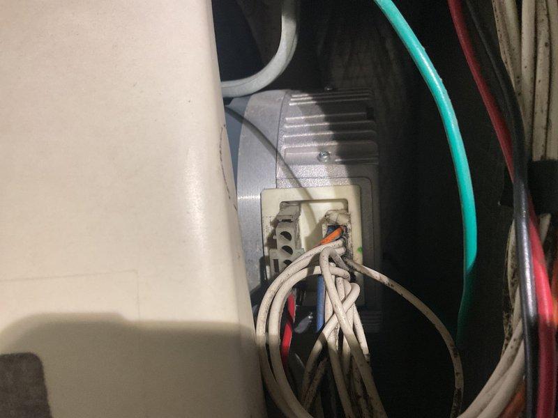 Performed annual heating maintenance on system. Inspected cooling coil and found minor dust accumulation with some bent fins. Checked electrical connections at terminal block and verified proper wire placement in junction box. All components functioning properly after service.