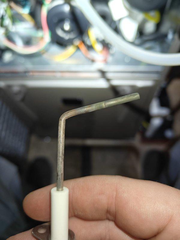 Performed 2025 heating maintenance service on commercial agreement. Inspected heating system components including flame sensor and heat exchanger gasket, documented condition with photos. Found mineral deposits and scale buildup on heat exchanger edge requiring cleaning to maintain efficient operation.