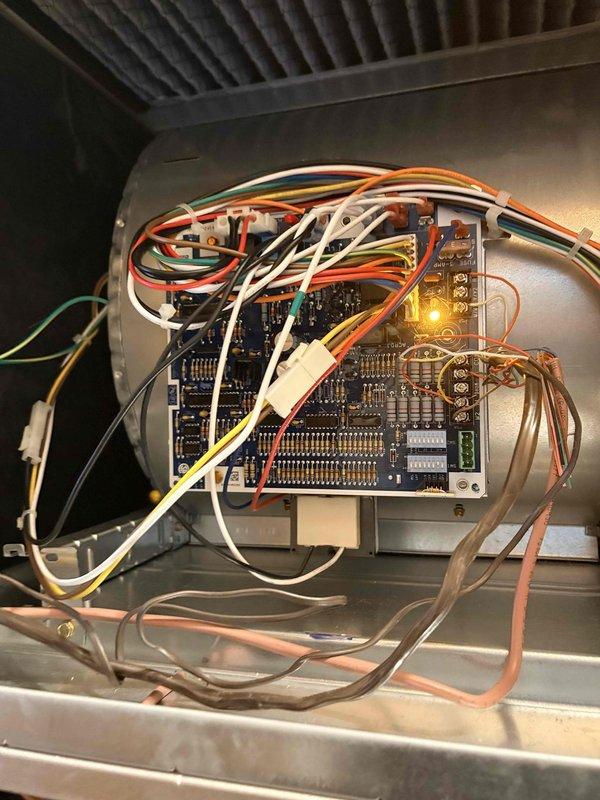 Performed routine heating tune-up on 4-year-old system. Inspected control board functionality with multimeter, verifying proper voltage readings at 4.06V. All wiring connections were verified secure and in good condition, with no issues found in the electrical control system.