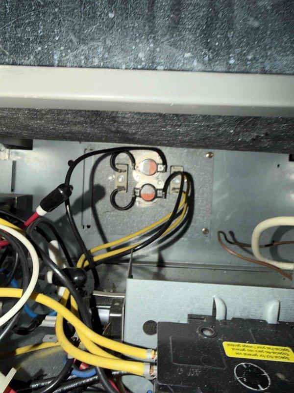 Diagnosed no-heat complaint in aging furnace system. Performed voltage testing at control board and verified proper voltage readings of 20.2V, indicating functional electrical supply. Inspected wiring connections at terminal blocks and found all connections secure with no signs of damage or corrosion.
