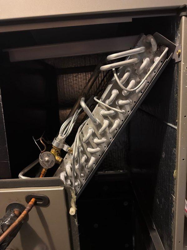 Performed comprehensive tune-up on residential HVAC system, including inspection of evaporator coil assembly and outdoor condenser unit. Verified proper refrigerant levels, cleaned accessible components, and confirmed system operation within manufacturer specifications. Customer advised about maintenance plan renewal options for continued system reliability.