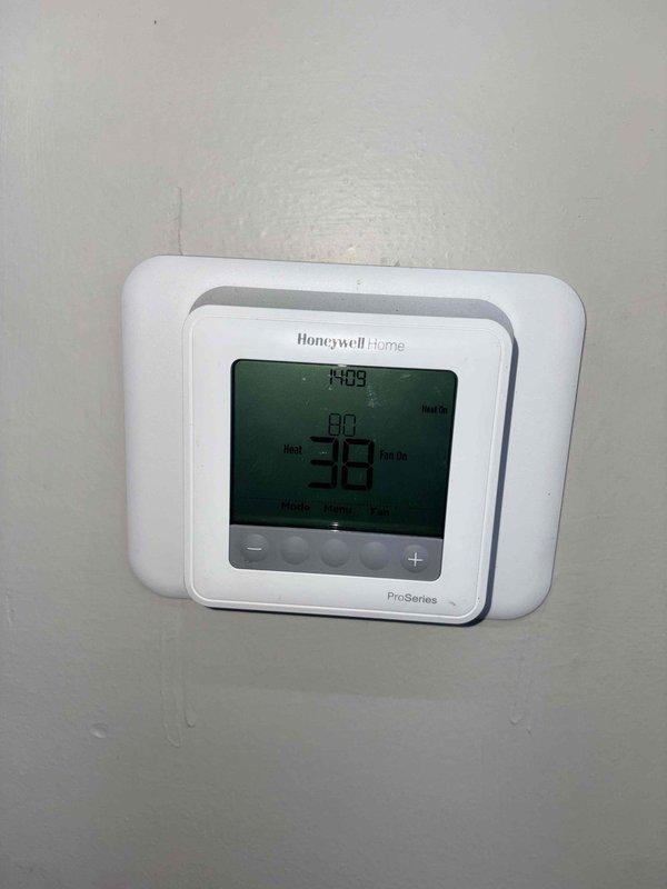 Responded to no heat complaint on commercial RTU. Diagnostic check revealed significant temperature differential between thermostat setpoint (80°F) and actual space temperature (46°F). Verified thermostat was properly calling for heat with system in heating mode and fan running. Completed necessary repairs to restore heating function to the unit.
