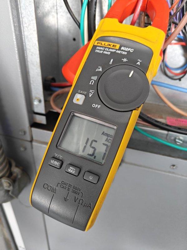 Performed annual heating maintenance on geothermal system. Conducted comprehensive electrical testing with Fluke 902FC meter, verifying current draw measurements at 1.9A and 15.7A AC on separate circuits to ensure proper electrical operation within manufacturer specifications.