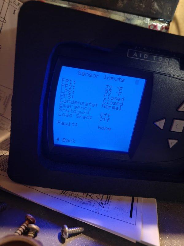 Performed diagnostic testing on HVAC system using digital analyzer, confirming proper sensor inputs with freeze protection sensors reading at 37°F and 38°F respectively. Identified need for new Freeze Protection Sensor and arranged for installation with part to be retrieved from shop. All pressure switches, condensate systems, and safety controls were verified operational with no active faults detected.