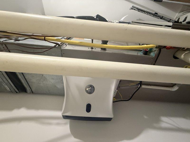 Conducted an on-site evaluation for potential installation of multiple steam humidifiers across existing HVAC systems. Inspected current thermostat configuration and examined mechanical installation space including PVC piping and flexible conduit that would accommodate humidifier integration. Assessment completed per customer's request to address indoor air quality concerns.