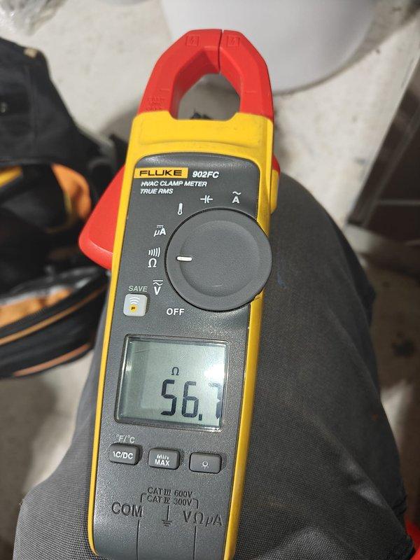 Performed monthly heating maintenance on system. Conducted electrical testing with Fluke 902FC clamp meter, measuring resistance at 56.7 ohms. Checked system pressure using UEI EM201B, which displayed 3.336 In-Wg, confirming proper operation within specifications.