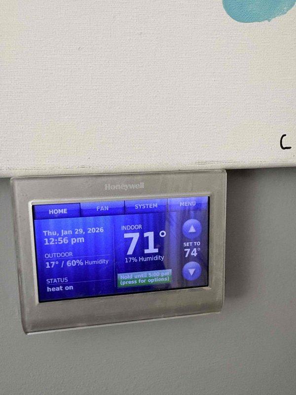 Responded to customer complaint of no heat with error code displayed on thermostat. Diagnostic testing revealed gas pressure measuring 0.29" WC, significantly below manufacturer specifications. Adjusted gas pressure to proper levels and verified proper operation of the Honeywell thermostat, confirming heat cycle is now functioning normally.