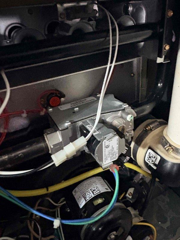 Responded to no heat call and installed new furnace system. Inspected and tested temperature readings through digital measurement device. Connected control valve and wiring components to ensure proper system functionality.