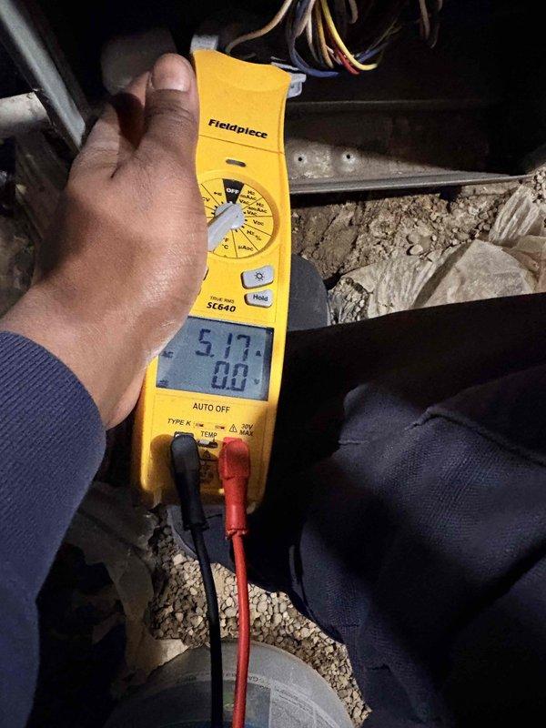 Performed annual tune-up on 9-year-old furnace system. Inspected blower assembly and confirmed proper condition of fan wheel components. Conducted electrical testing with clamp meter, measuring current draw at 5.17 amps, which is within normal operating parameters.