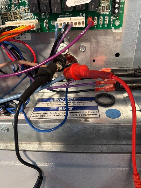 Performed comprehensive tune-up on HVAC system, including inspection of control board circuitry and wiring connections. Verified proper grounding of alarm system and conducted temperature measurements using digital meter, recording ambient reading of 21.5°C. Discussed maintenance plan options with customer for future service consideration.