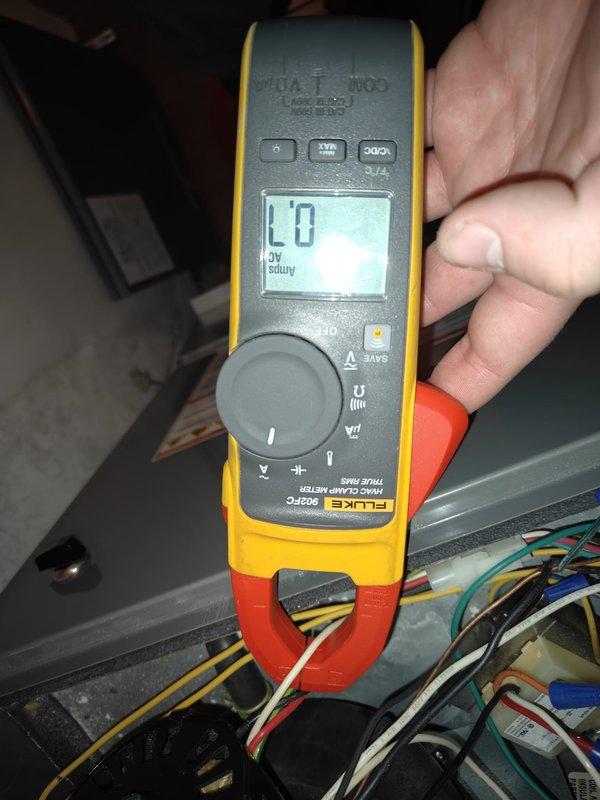 Performed routine heating maintenance service, inspecting system components for dust accumulation. Used Fluke clamp meter to measure electrical current through system wiring, ensuring proper electrical operation of the heating unit.
