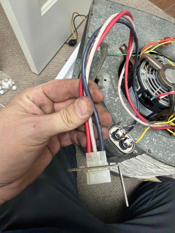 Responded to no heat complaint for upstairs furnace with non-functioning auxiliary heat. Diagnosed electrical issue in the blower motor assembly. Rewired and reconnected the damaged harness connector to restore proper electrical connections to the motor terminal block. Successfully restored heat functionality to both main and auxiliary heating systems.
