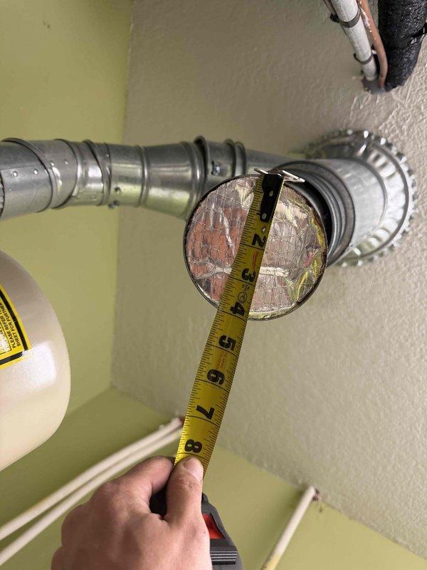 Performed comprehensive inspection of heating system in response to customer concerns about poor air quality and possible CO2 issues. Examined attic-installed equipment with particular attention to venting components, including PVC exhaust pipe and ductwork connections. Verified proper duct sizing and connection integrity with measurements. No evidence of venting issues or carbon monoxide leakage was detected, confirming findings from previous service visit.