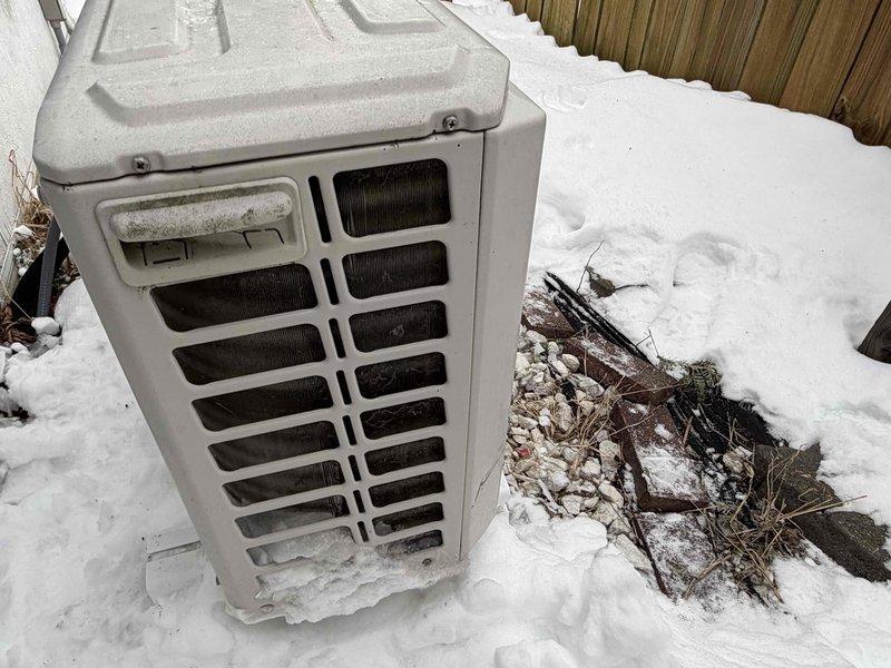 Responded to customer concern regarding ice formation on outdoor unit. Performed visual inspection of the heat pump system, which revealed normal frost accumulation on the outdoor coil during defrost cycle. Confirmed unit is operating properly with no evidence of damage; educated customer on normal winter operation patterns of heat pump systems and proper snow clearance procedures around outdoor equipment.