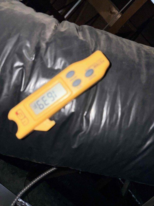 Performed heating maintenance on Suite C's system per maintenance agreement. Checked and replaced 20x20x1 air filter. Measured temperature readings (52.3°F) on supply ductwork to verify proper system operation.