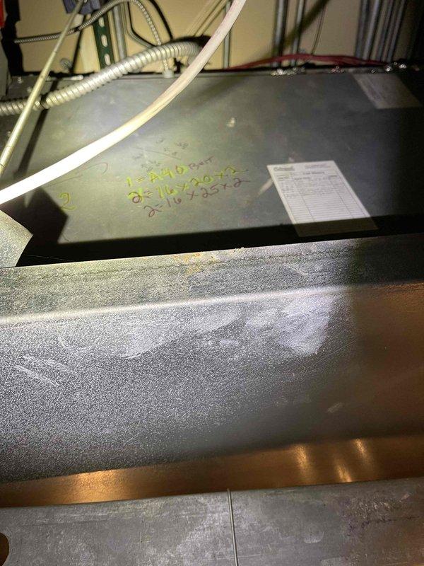 Conducted comprehensive equipment audit at Clayton's Country Bar for PSA agreement preparation. Documented Carrier HVAC system with appropriate measurement tools and recorded equipment specifications including filter and belt sizes. Photographed all units with handwritten maintenance dates and compiled complete location diagrams for future service reference.