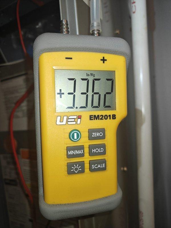 Performed cooling system maintenance including static pressure testing with UEI EM201B manometer (reading +3.362 In-Wg) and made adjustments using hex key to optimize system performance. All readings now within manufacturer specifications.
