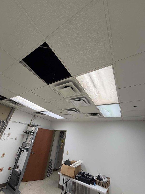 Responded to no heat complaint in server room. Investigated RTU that was leaking into the space, which required accessing the unit through ceiling panels. Diagnostic revealed issues with the HVAC system affecting both temperature control and causing water intrusion. Completed initial assessment and documented conditions with before/after photos as required.