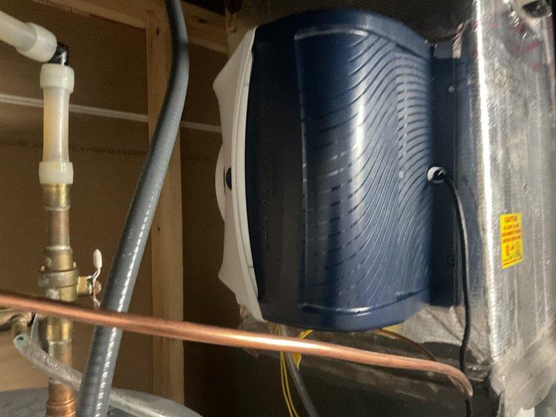 Successfully installed a new Aprilaire 720M powered humidifier in customer's mechanical room. Connected low voltage wiring to the existing Ecobee thermostat for integrated control of the humidification system.