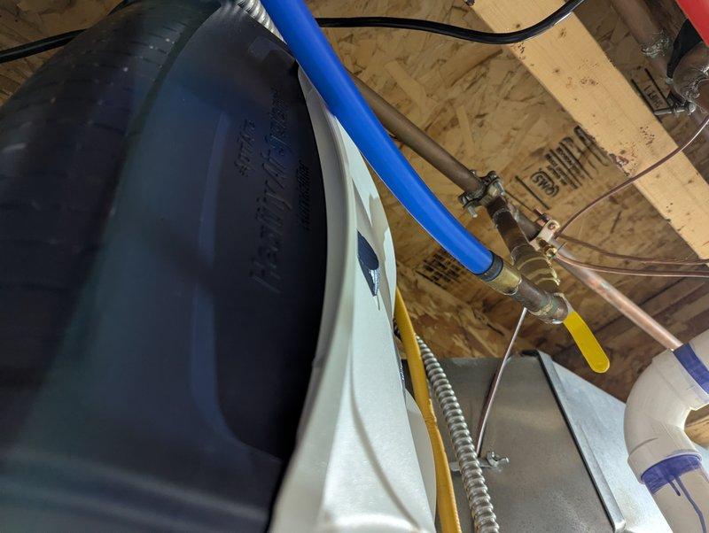 Performed inspection and repair on humidifier system. Identified needed 3/4-inch Pro press coupler to properly connect copper piping to PEX line. Rotated pipe connection to ensure proper alignment and function, then tested humidifier operation and inspected water panel for proper condition.