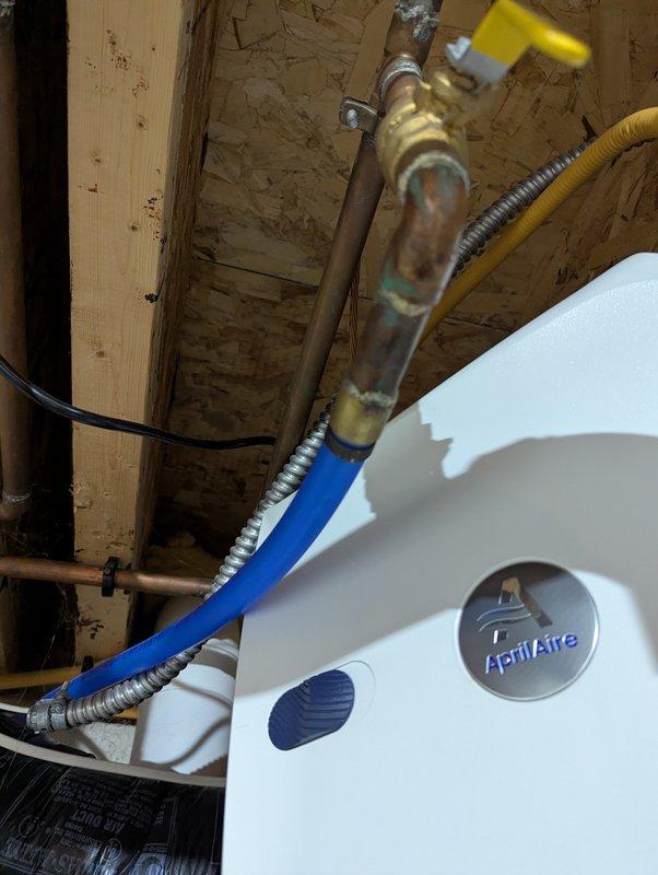 Performed inspection and repair on humidifier system. Identified needed 3/4-inch Pro press coupler to properly connect copper piping to PEX line. Rotated pipe connection to ensure proper alignment and function, then tested humidifier operation and inspected water panel for proper condition.