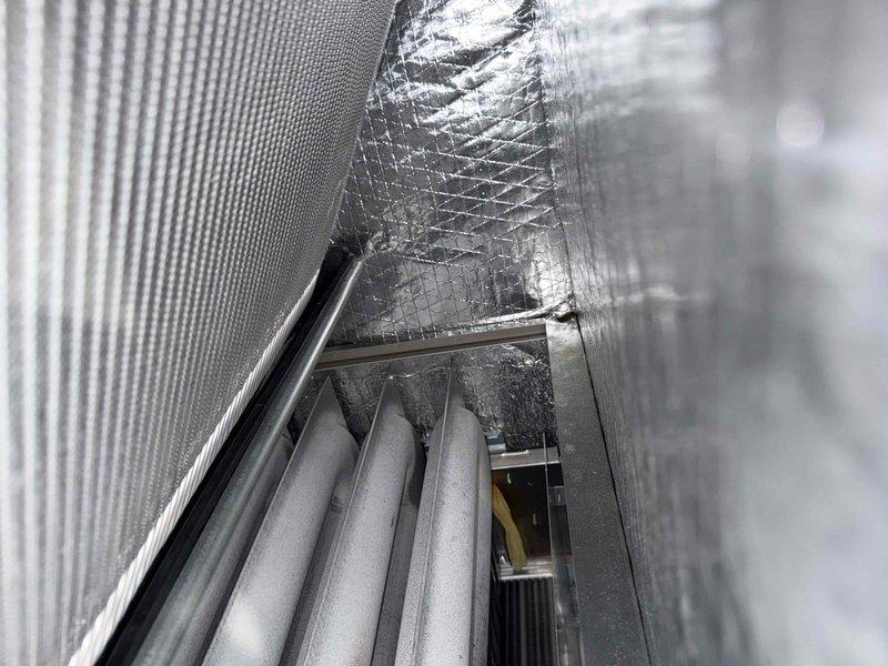 Completed initial heating maintenance service for the season. Inspected and confirmed proper installation of pleated air filter in the furnace system. Examined ductwork and insulation, noting proper installation of reflective foil insulation and ventilation components.