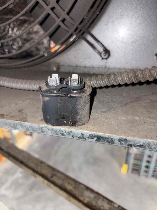 Performed comprehensive commercial maintenance service on hanging heaters and furnace system. Inspected and documented condition of motor run capacitor showing signs of dirt accumulation and wear. Installed new 20x25x1 filter and completed standard cleaning procedures on all equipment components per maintenance protocol.