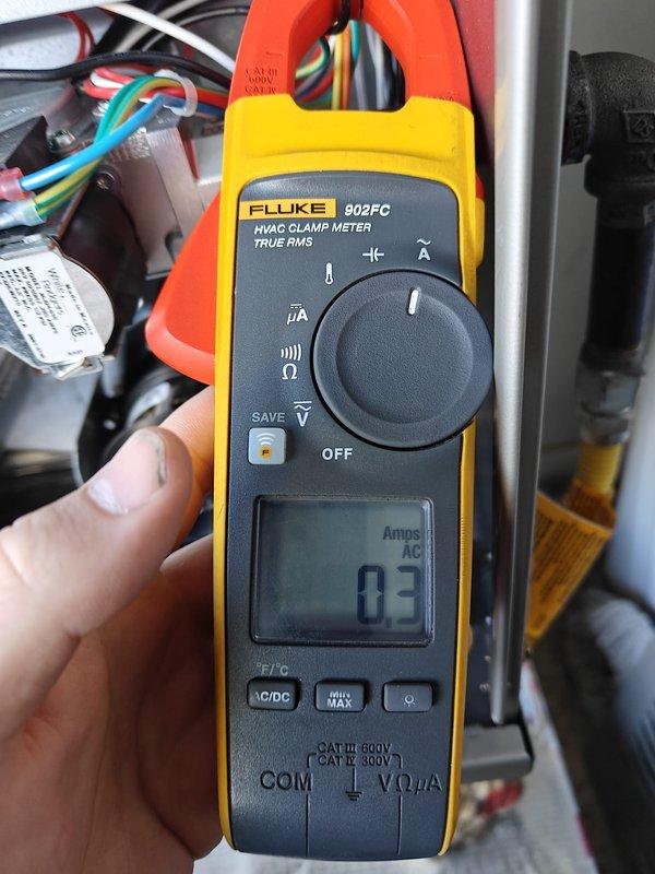 Performed heating maintenance on system including filter inspection and replacement. Conducted electrical testing with clamp meter showing 0.3 Amps AC draw, confirming proper electrical operation. All components verified functional with system operating within manufacturer specifications.