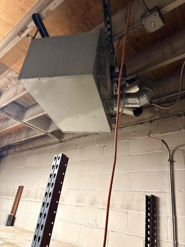 Responded to service call for three malfunctioning hanging heaters. Diagnosed first unit with cycling issues requiring manual reset after each shutdown. Second unit completely non-operational. Third unit missing thermostat connection and associated piping. Inspected blower motor assembly and identified wiring issues and corrosion on connection points. All units accessible via 6-foot ladder.
