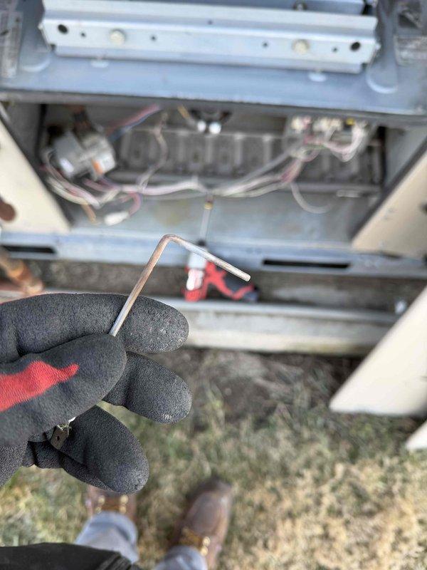 Performed comprehensive heating maintenance on unit. Inspected motor assembly and electrical connections, verifying proper wire connections and harness integrity. Accessed unit's interior components using Allen key to conduct thorough inspection and maintenance of operational systems.