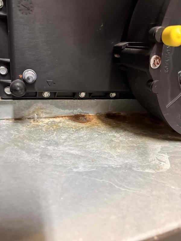 Performed gas furnace cleaning service as scheduled. Inspection revealed significant corrosion and water damage on metal surfaces, particularly near drainage components. Documented rust formation around equipment housing and mounting areas, indicating possible ongoing moisture exposure that requires monitoring.