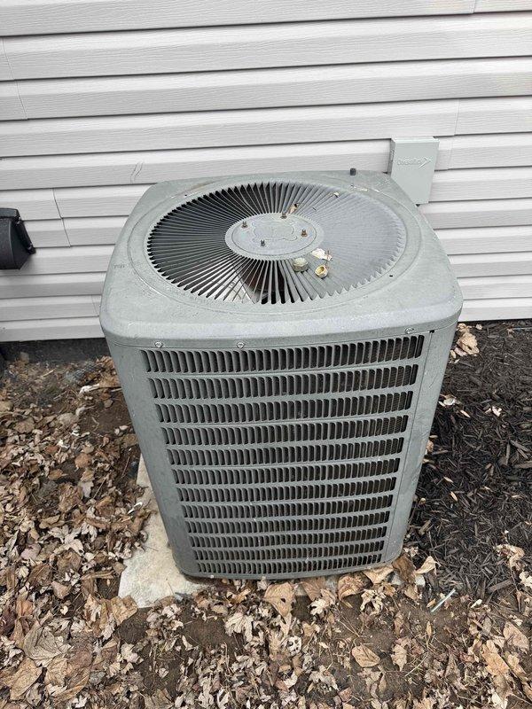 Performed second opinion assessment on aging air conditioning system. Inspected outdoor condensing unit showing signs of weathering but operational condition, and found significant corrosion with mineral deposits on evaporator coil components. Confirmed previous technician's diagnosis that A-coil is missing, presented repair options versus full system replacement recommendation due to unit's age exceeding 10 years and visible deterioration.