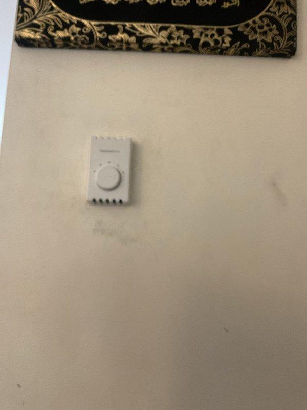 Responded to no heat call and inspected manual thermostat system. Identified issue with older wall-mounted thermostat that was not properly controlling heating function. Replaced thermostat with compatible unit, calibrated settings, and verified proper system operation through complete testing cycle. System now functioning correctly with consistent temperature control.
