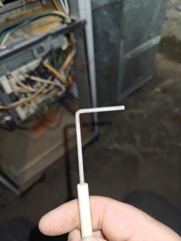 Performed annual heating maintenance service, replacing severely clogged air filter with new one from designated supply box. Conducted system inspection using hex key tool to access control board, checked electrical connections and verified proper operation of heating components.