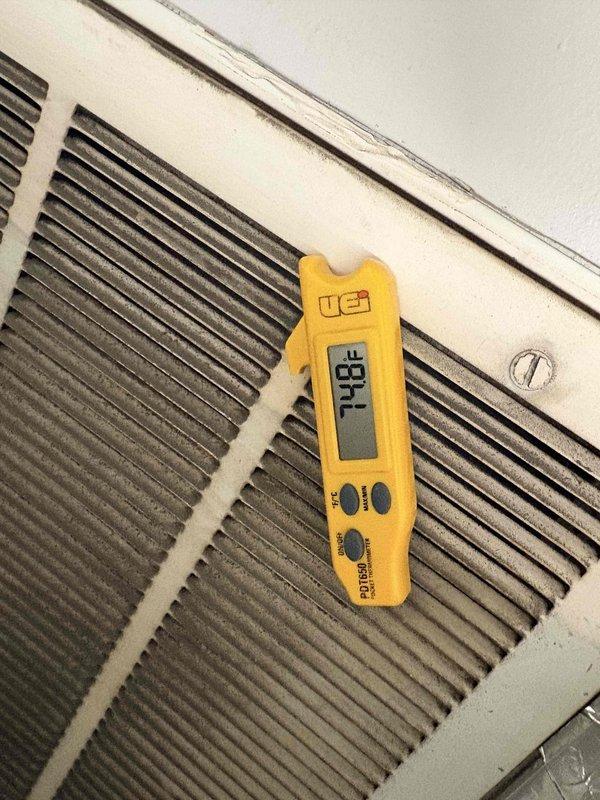 Responded to commercial geothermal unit blowing cold air when thermostat was calling for backup heat. Diagnostic testing revealed supply air temperature of 74.8°F and return air temperature of 98.4°F, confirming reversed airflow. Adjusted system settings to correct the temperature differential issue.