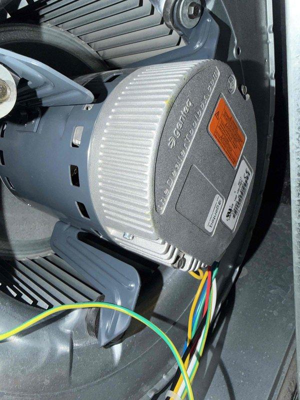 Performed annual heating maintenance service including electrical testing of Genteq ECM motor with multimeter confirming proper resistance values at 59.3 ohms. Visual inspection of motor wiring connections and mounting showed all components in good working condition with no signs of deterioration or damage.