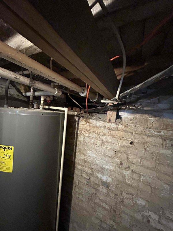 Performed diagnostic assessment on non-functioning furnace that customer reported was making a humming noise before failing completely. Inspected existing HVAC system including the outdoor condensing unit and basement furnace installation. Recommended complete system replacement based on evaluation findings and prepared estimate for new equipment.