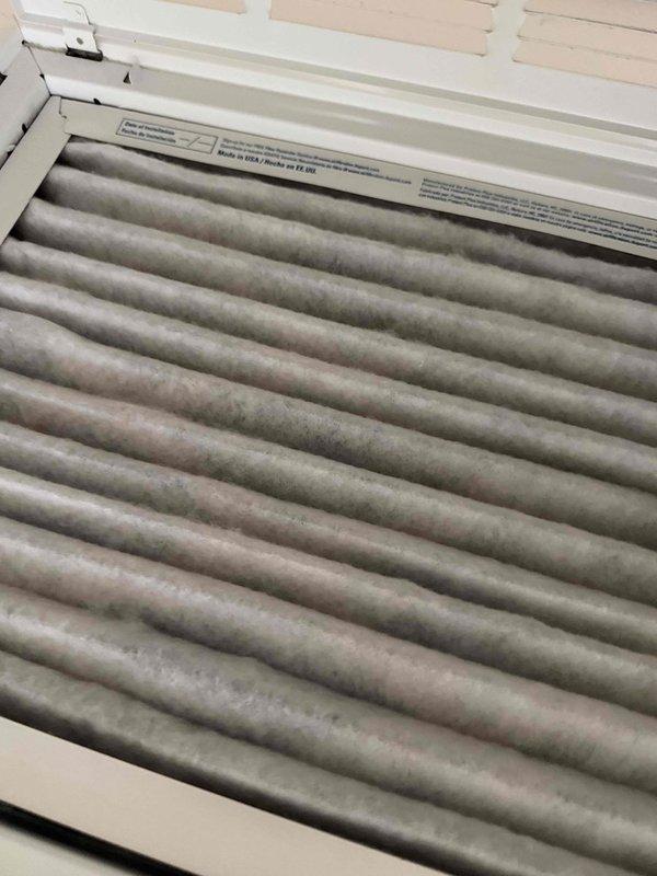 Completed annual heating maintenance service including inspection of filter condition and replacement due to visible dust accumulation. Verified exterior condenser unit was properly positioned on concrete pad with adequate clearance. System now operating at optimal efficiency for the heating season.