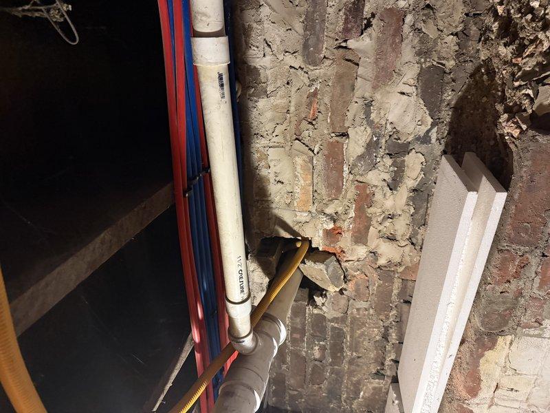 Conducted an on-site evaluation of the property to provide a comprehensive zoning estimate. Inspected existing plumbing infrastructure including PVC, copper, and supply lines mounted against brick wall in basement area. Examined electrical components and wiring configuration to determine compatibility with proposed zoning system.