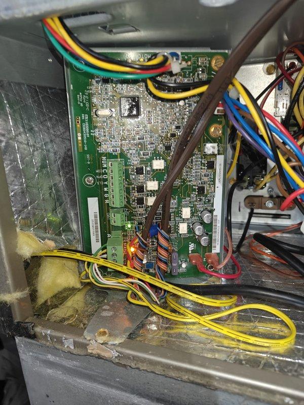 Performed 2025 Heating Maintenance First Service, inspecting evaporator coil assembly which appeared in good condition with no visible damage or excessive dirt accumulation. Control board inspection showed proper operation with illuminated indicator light and well-organized wiring connections.