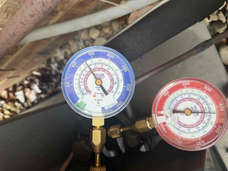 Diagnosed heat pump failure on 10+ year old system. Found severely dirty evaporator coil with standing water and debris in drain pan. Performed pressure testing which confirmed refrigerant issues. System requires full replacement; measurements and photos have been taken for equipment ordering.