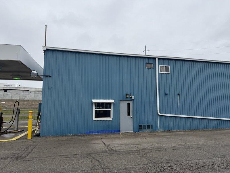 Conducted site assessment at blue metal commercial building to prepare estimate for installation of two mini-split systems. Documented exterior conditions and building characteristics through comprehensive photography to develop appropriate HVAC solution. Estimate completed as requested with pricing information to be provided directly to authorized contact rather than on-site manager.
