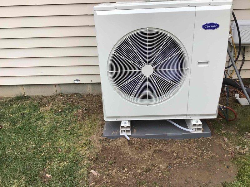 Installed new Carrier 3-ton Crossover heat pump system with 15 KW auxiliary heat kit and Ecobee thermostat, mounted on new pad with risers. Job included installation of new disconnect, Aprilaire filtration system, and reusing existing copper line-set after proper flushing, completing a full system replacement with upgraded components.