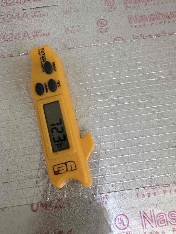 Performed quoted repairs on HVAC system. Temperature measurements were taken using UEi PT150 digital thermometer, recording readings of 123°F on reflective insulation material and 19.9° at another measurement point, confirming proper system operation after repair completion.