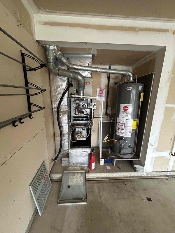 Completed inspection of HVAC system in vacant home listed for sale. Unit shows significant age with compromised insulation and exposed internal components. Customer requested replacement estimate and will decide between repair or replacement options. Access provided via garage code 0911.