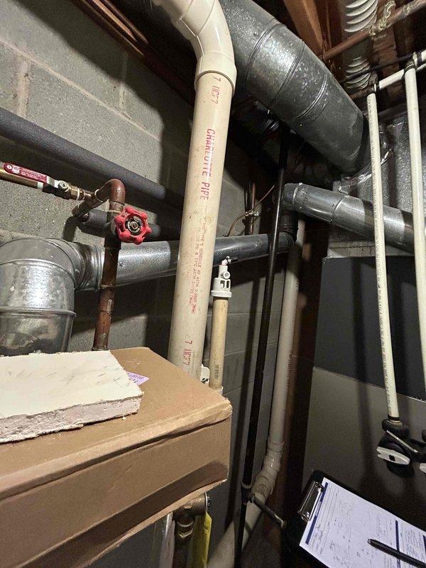 Performed comprehensive evaluation of existing HVAC system following referral from existing client. Visual inspection revealed failed heat exchanger and malfunctioning control board requiring full system replacement. Documented existing thermostat configuration and evaluated current ductwork in utility area to prepare detailed replacement estimate.
