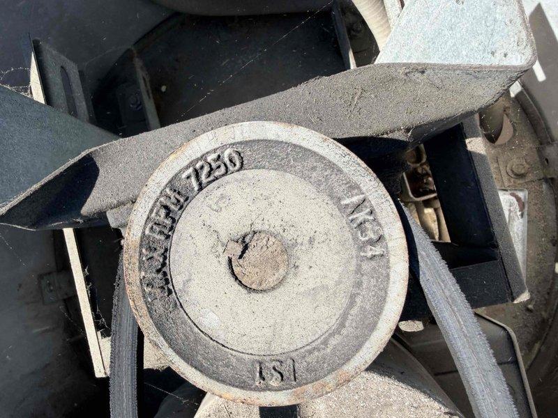 Conducted diagnostic assessment on three malfunctioning split systems and evaluated rooftop exhaust fan which showed significant dirt accumulation and wear. Identified two units with reduced cooling capacity and one completely non-operational system, with recommendation to improve ventilation for units under mezzanine by routing trapped heat through existing flue to exhaust fan.