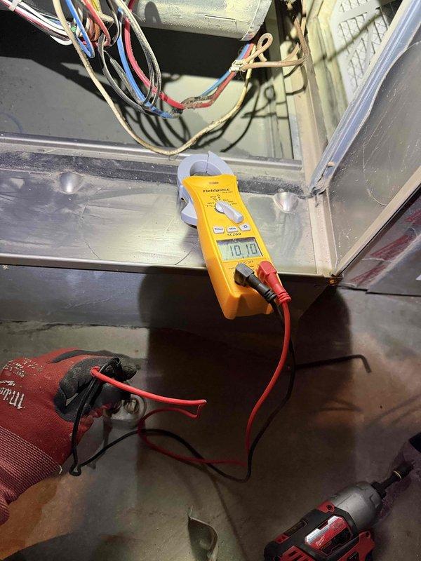 Performed scheduled heating maintenance service on system. Inspected and cleaned blower wheel assembly to ensure proper operation. Conducted electrical testing with multimeter, verifying proper voltage readings of 10.10 at component connections. Replaced 20x25x1 air filter as requested by customer.