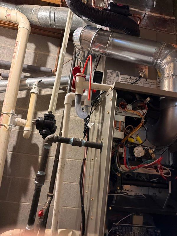 Successfully installed a new Carrier 80% efficient 2-stage Performance 70K BTU gas furnace with a 2-ton, 2-stage Performance A/C system and Ecobee thermostat. The complete installation included an Aprilaire media filter, disconnect, pad, 40-gallon gas water heater, proper PVC venting, condensate drainage with trap, and comprehensive duct cleaning to ensure optimal system performance.
