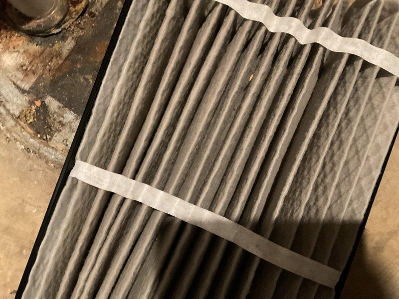 Performed routine heating maintenance on four heating systems across property (2 in main house, 1 in main house south, 1 upstairs). Replaced heavily soiled air filter with significant dust accumulation. Inspected furnace unit in utility area, examined ductwork connections and control wiring, and addressed reported heating issues in nursery area.